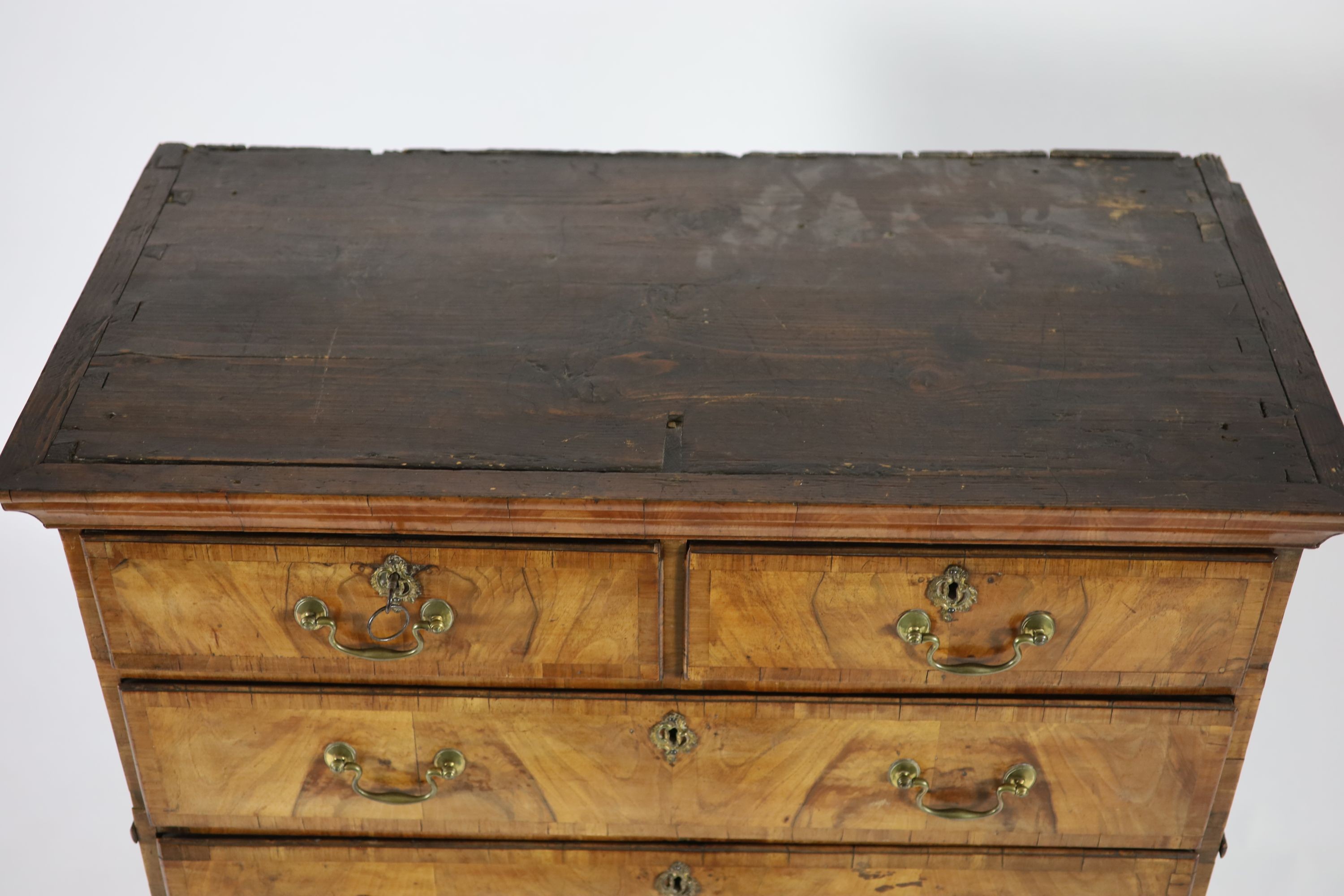 A George II walnut chest on stand W.102cm D.51cm H.132cm